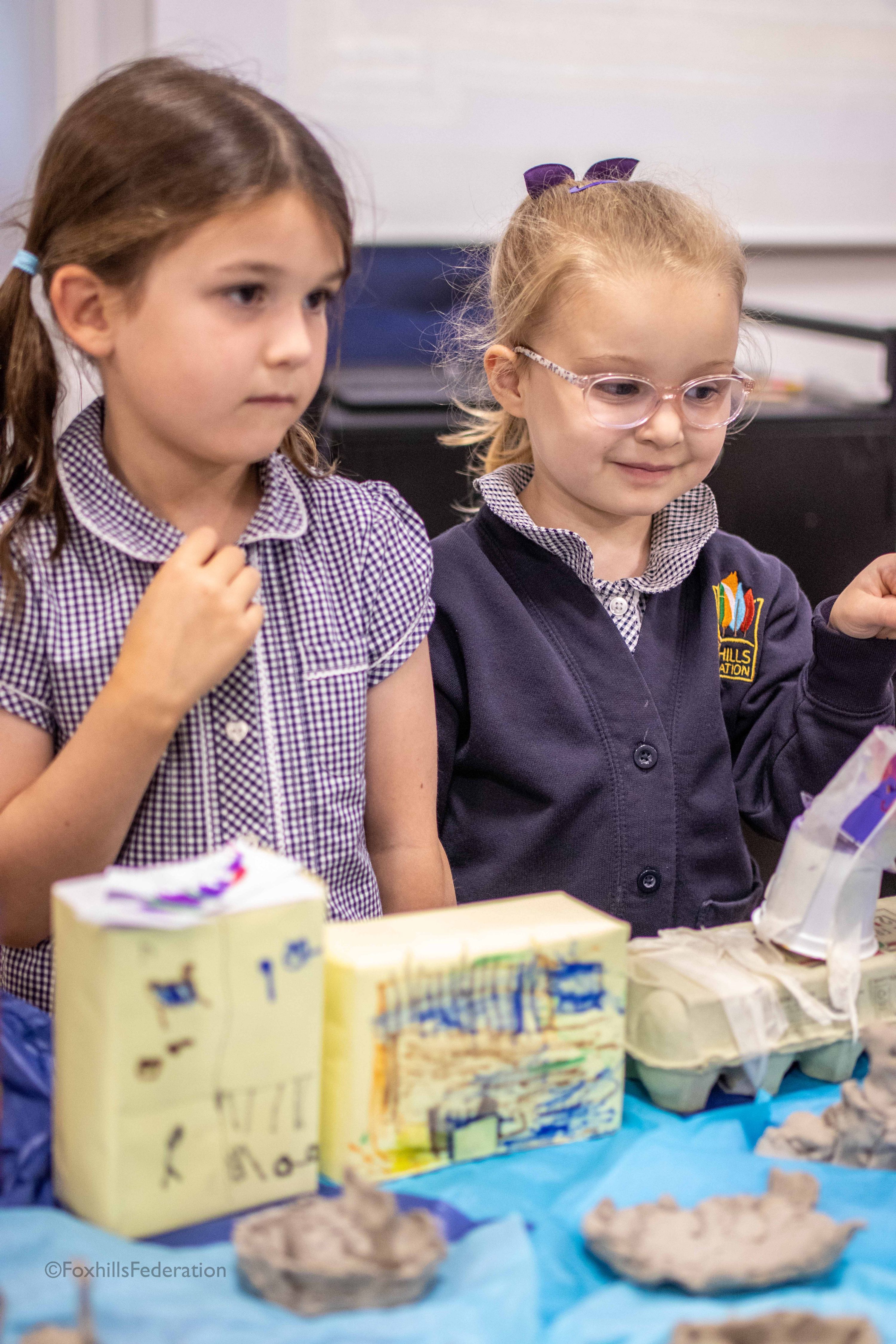 Children look at a exhibit