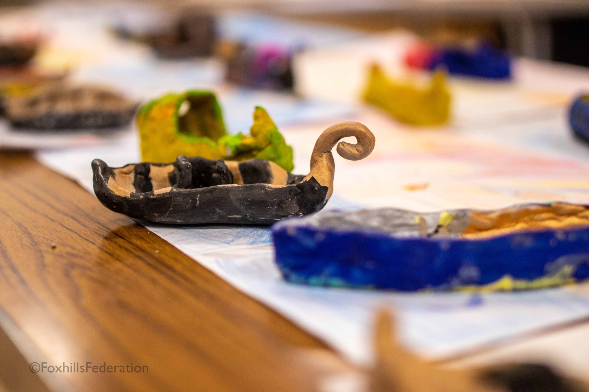 Colourful boats made by children