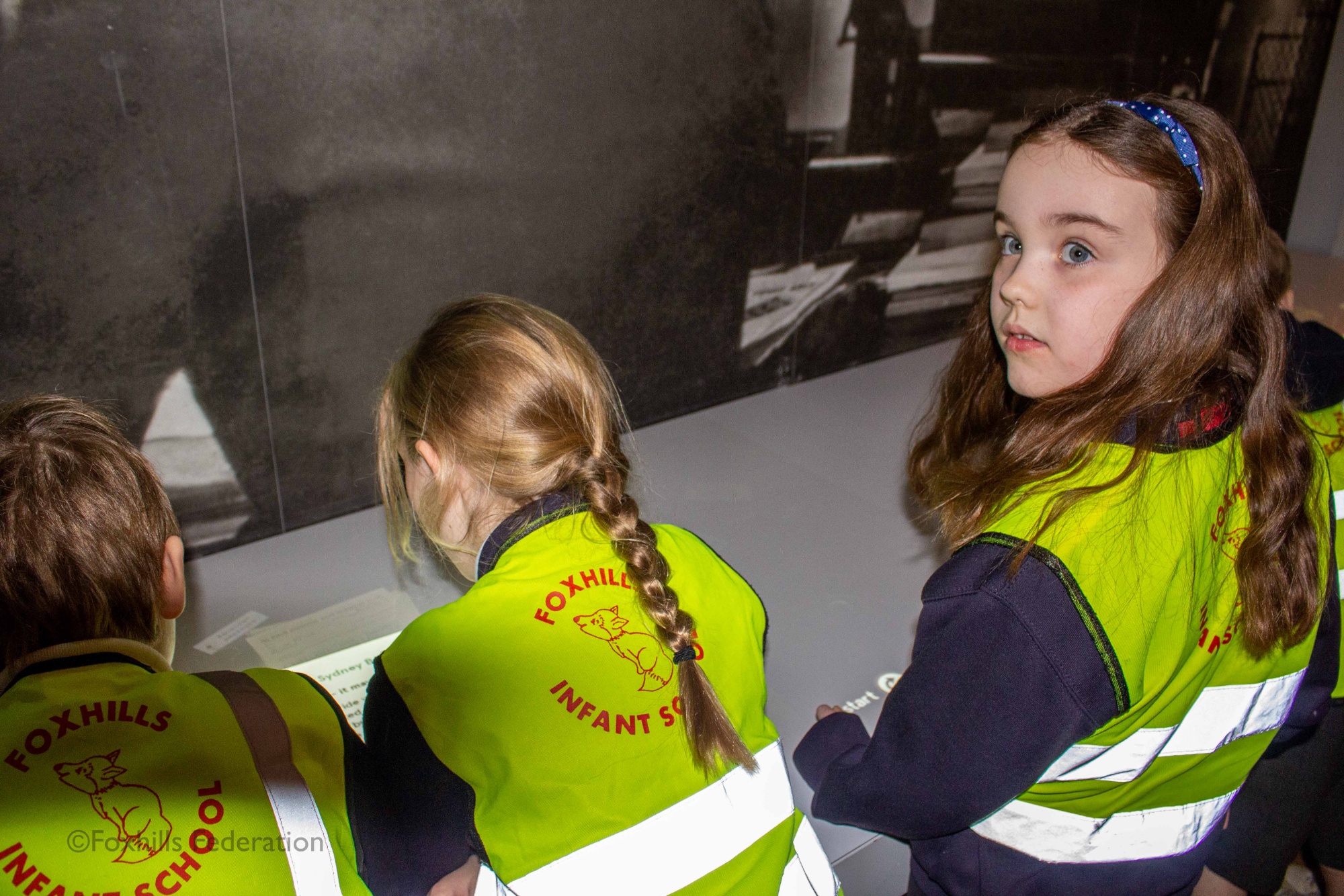 Children look at exhibits in the SeaCity museum.