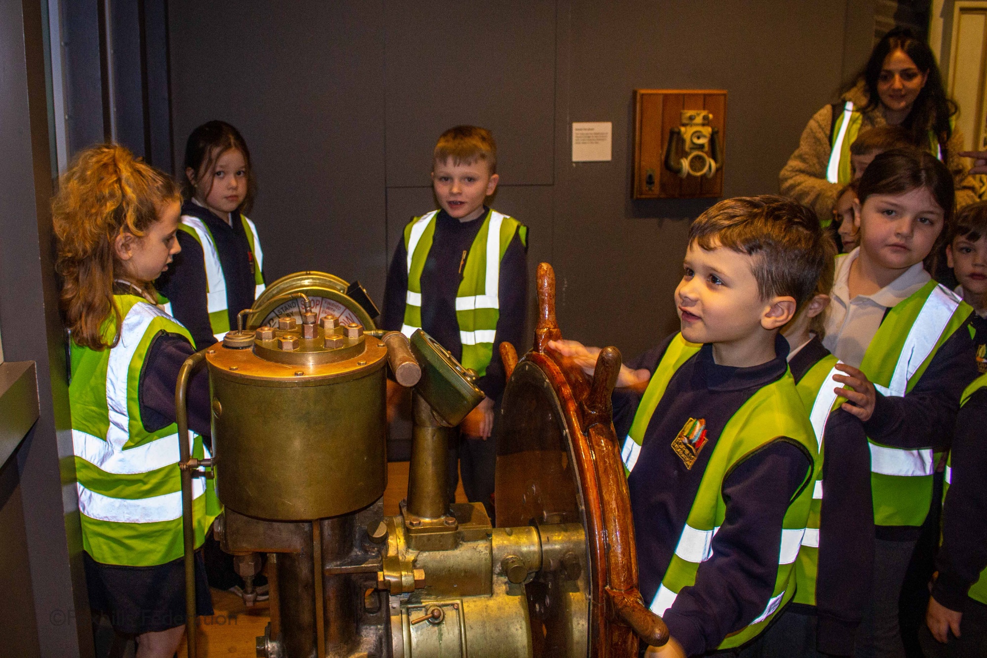 Children look at exhibits in the SeaCity museum.