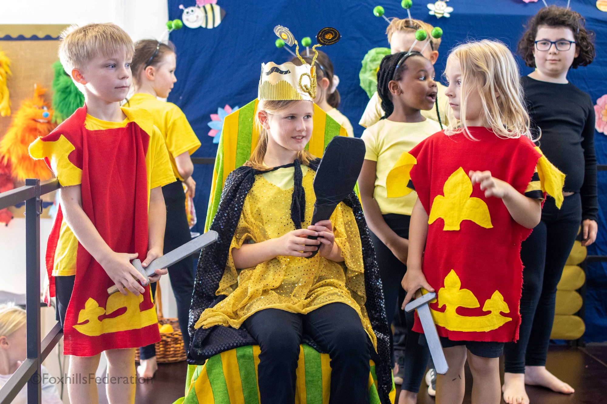 The queen bee sits on her thrown