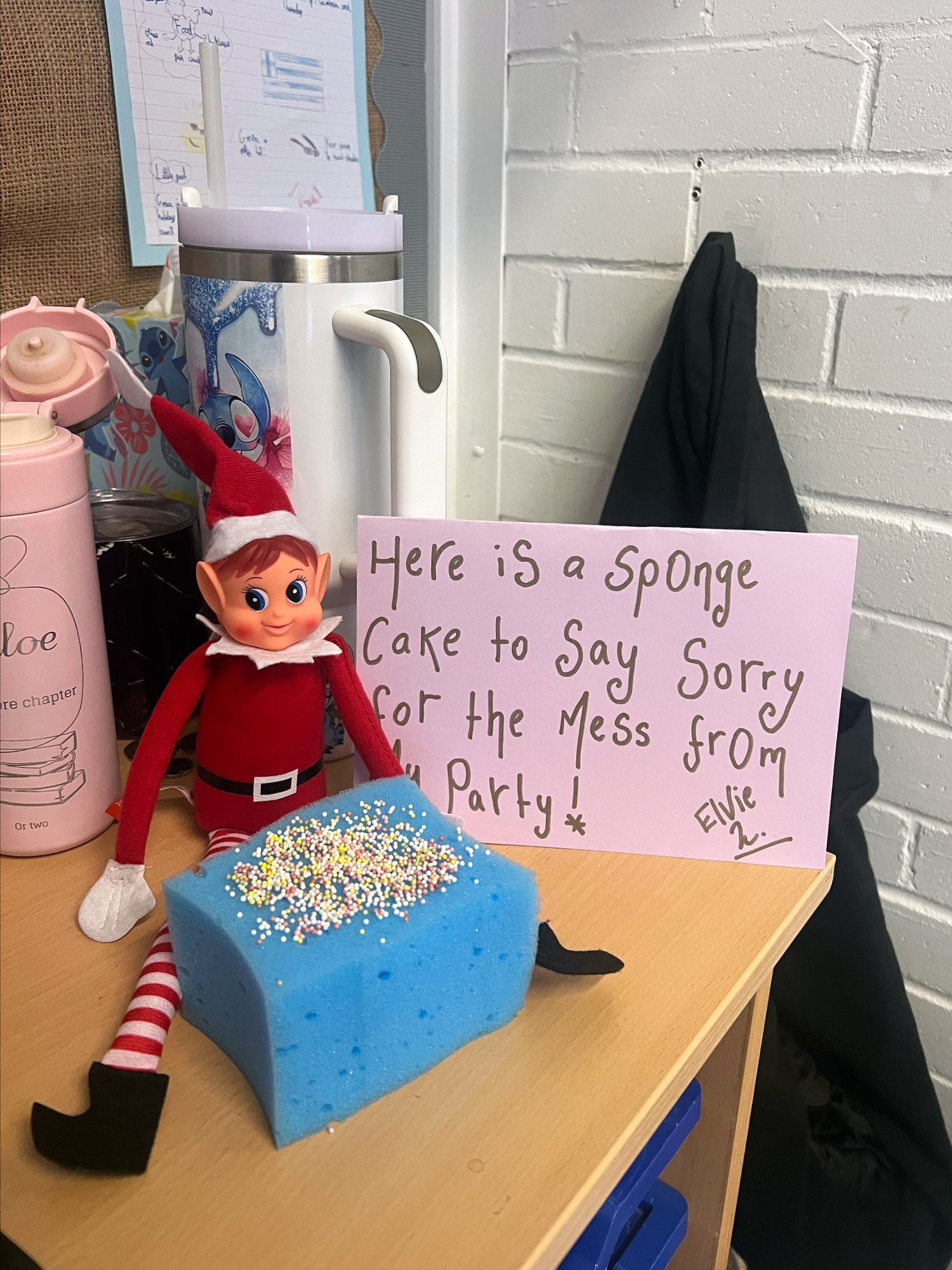An elf with a sponge cake made from sponge.