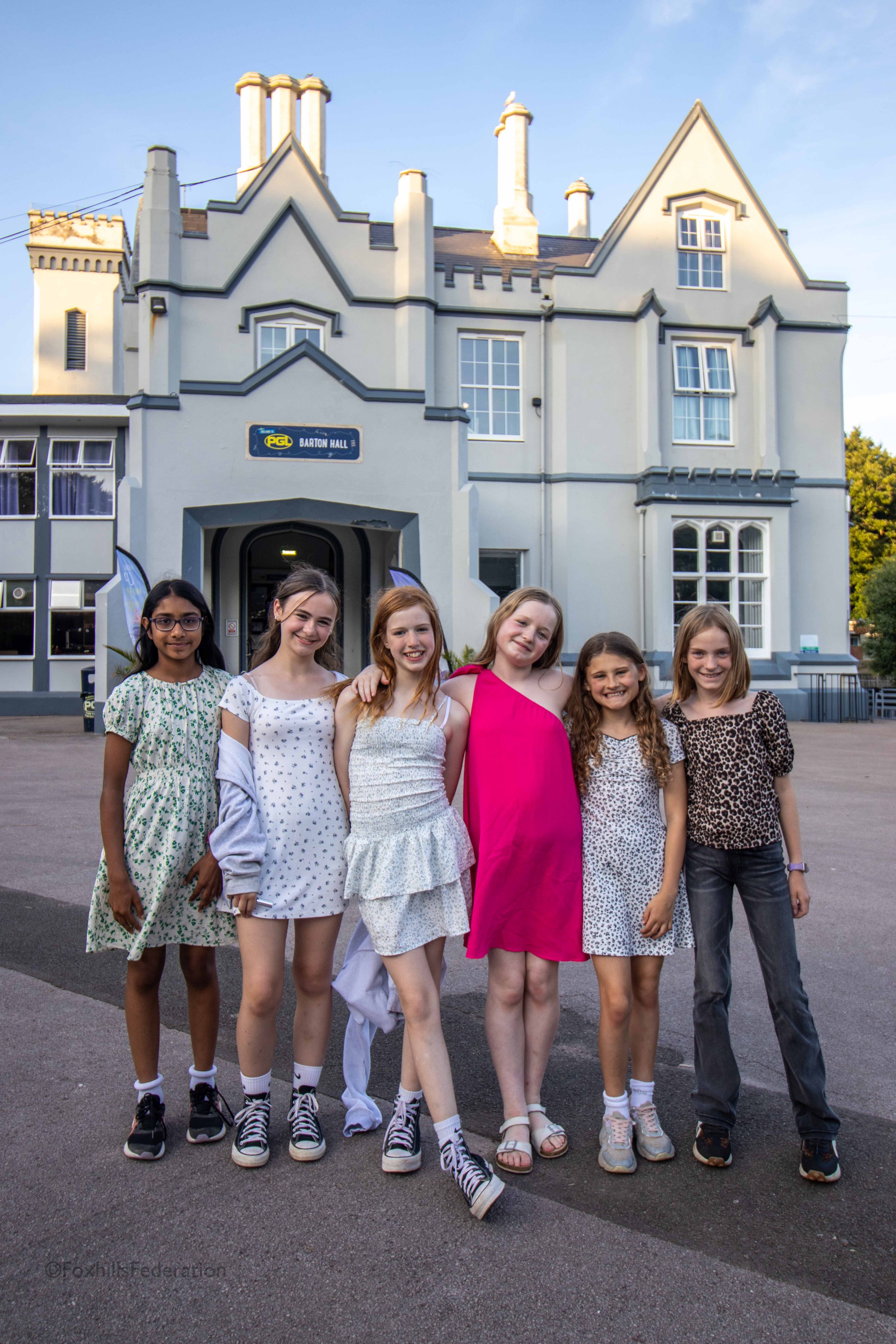 A group of children pose before the disco