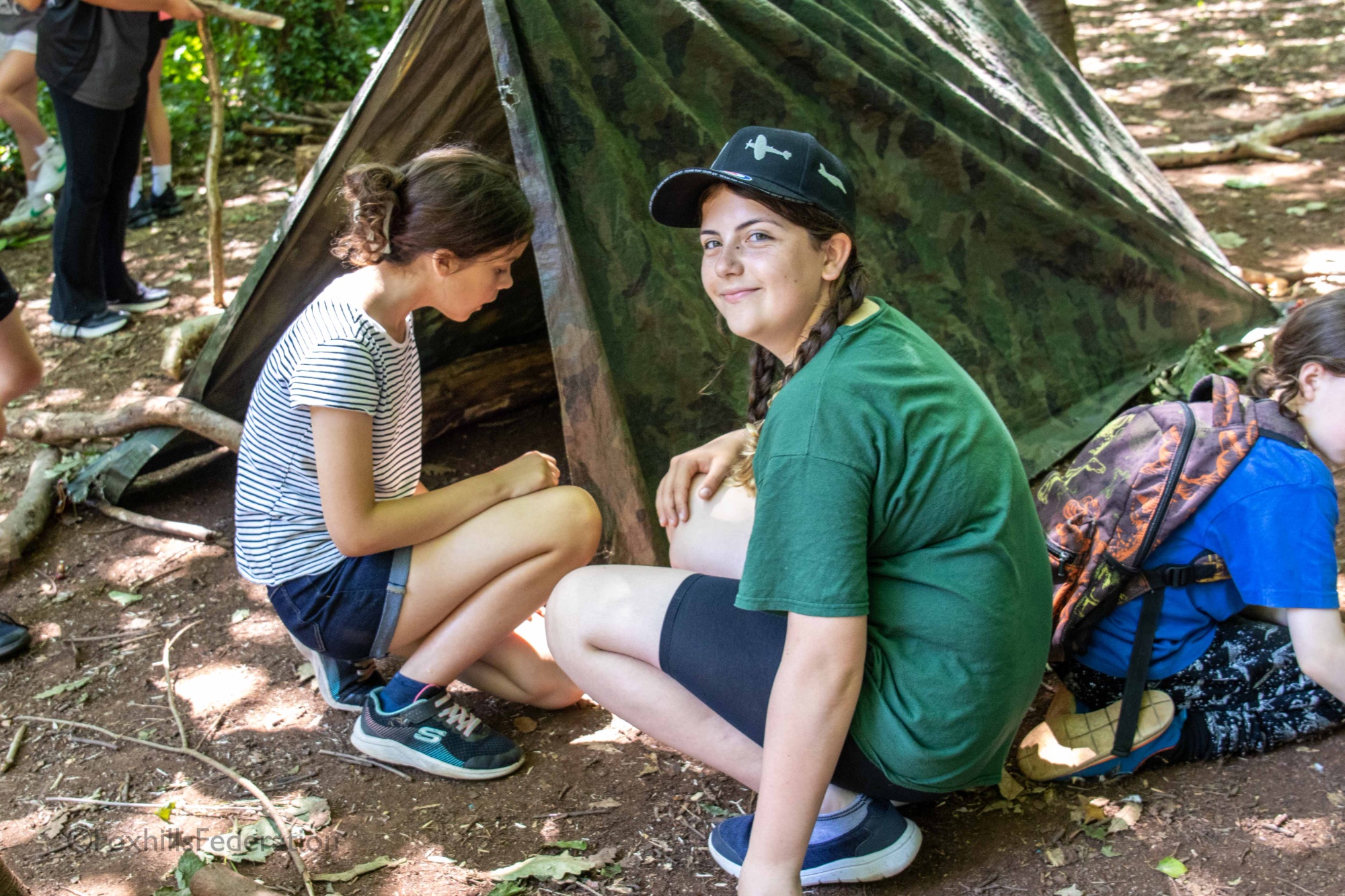 Children create a den