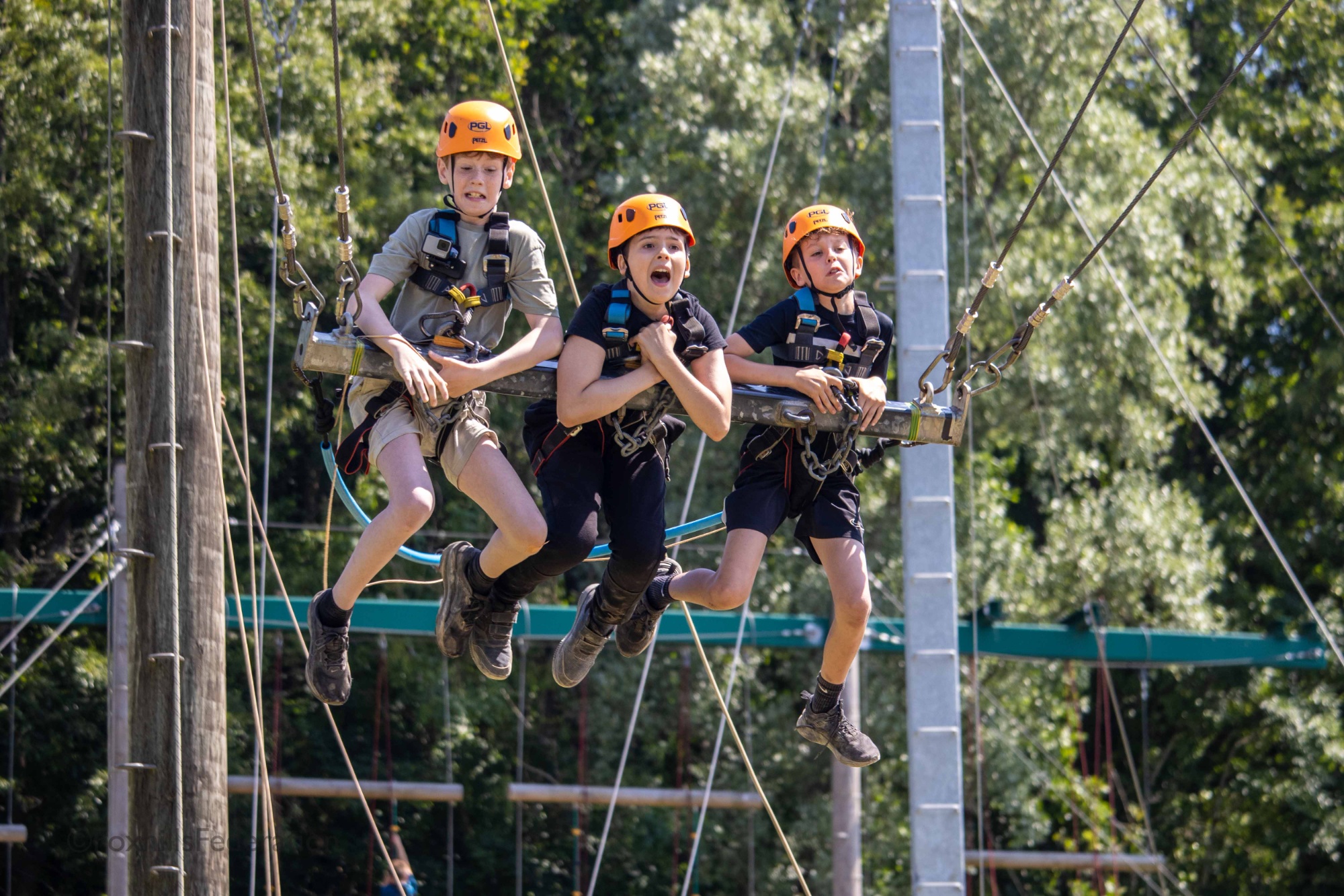Children scream on the giant swing
