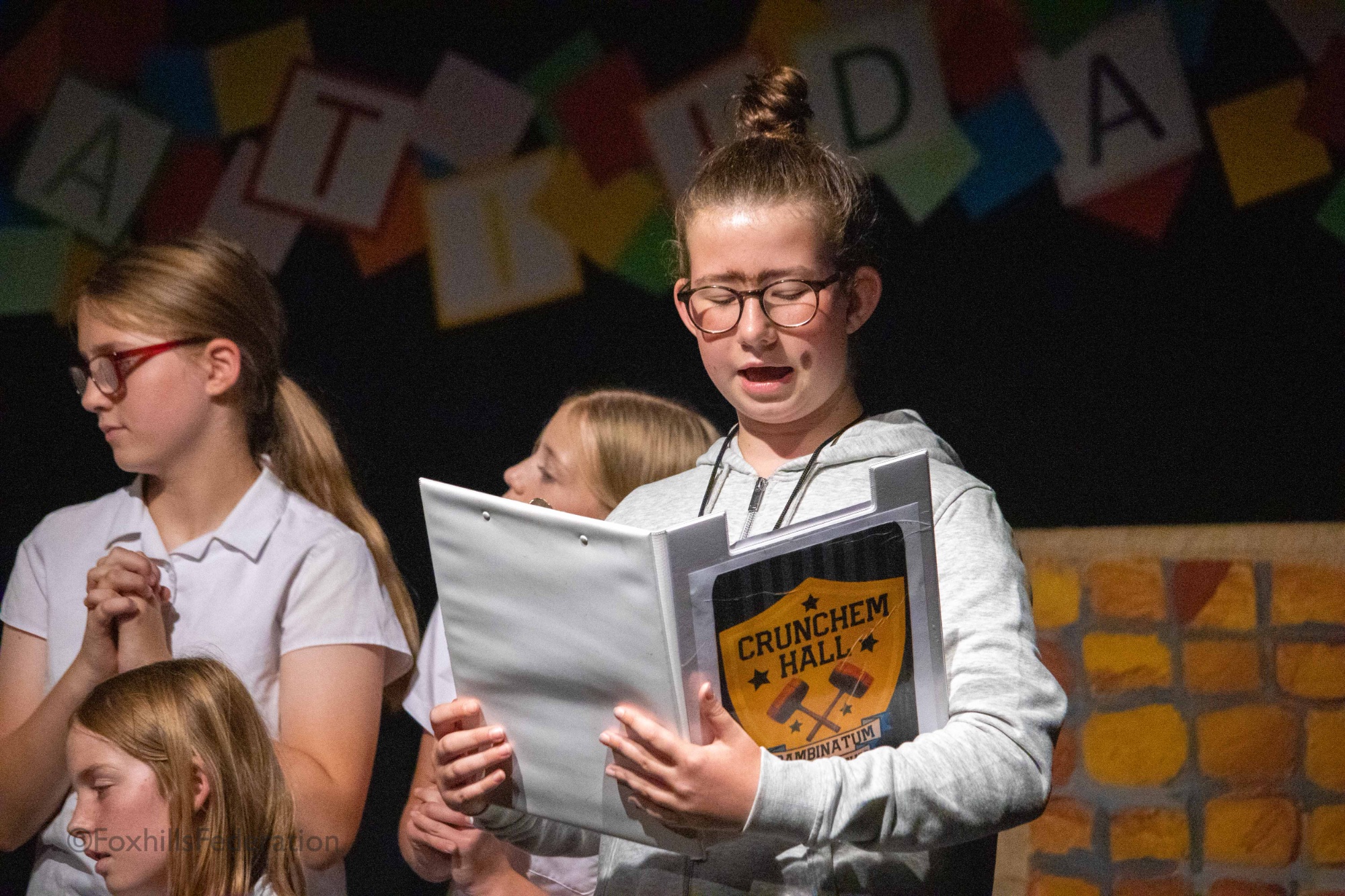 Miss Trunchbull reads from a book