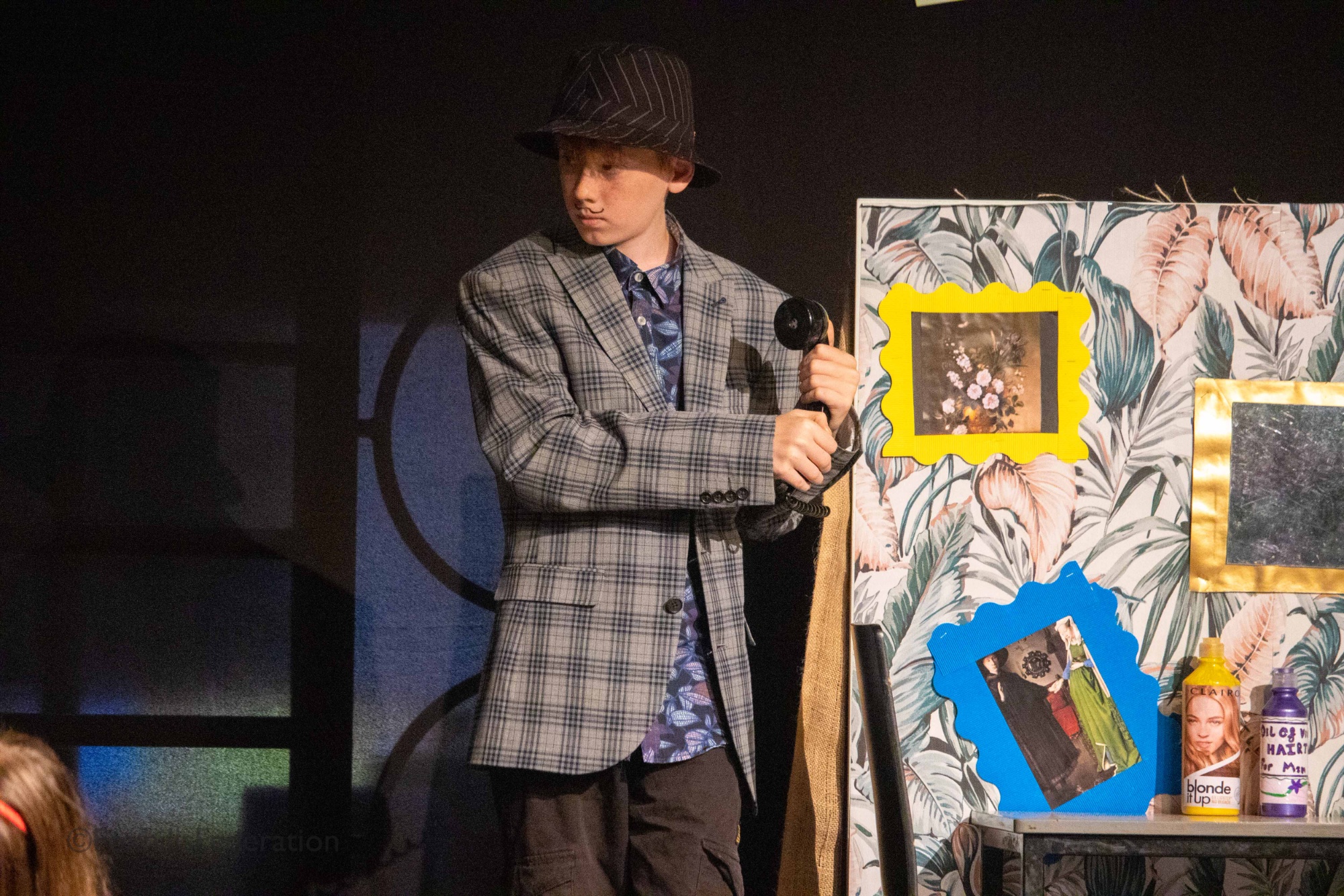 Mr Wormwood talks on a phone