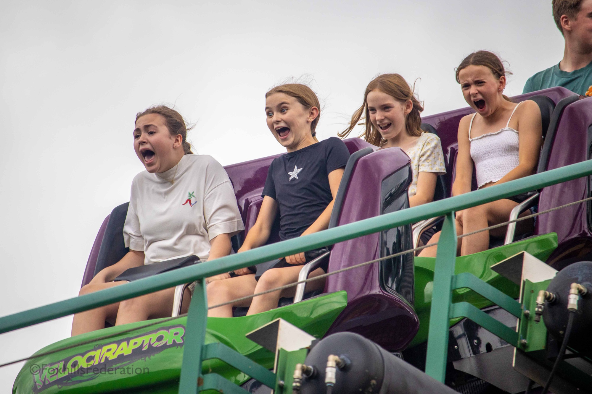 Children scream on a rollercoaster