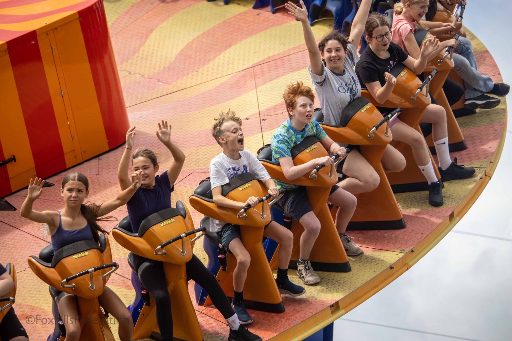 Children ride "The Edge"