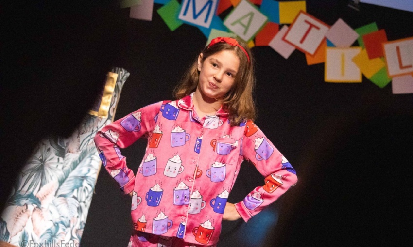 A photo from the Year 6 school play showing Matilda with her hands on her hips