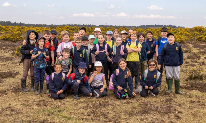 Hawthorn class pose for a photo in the New Forest